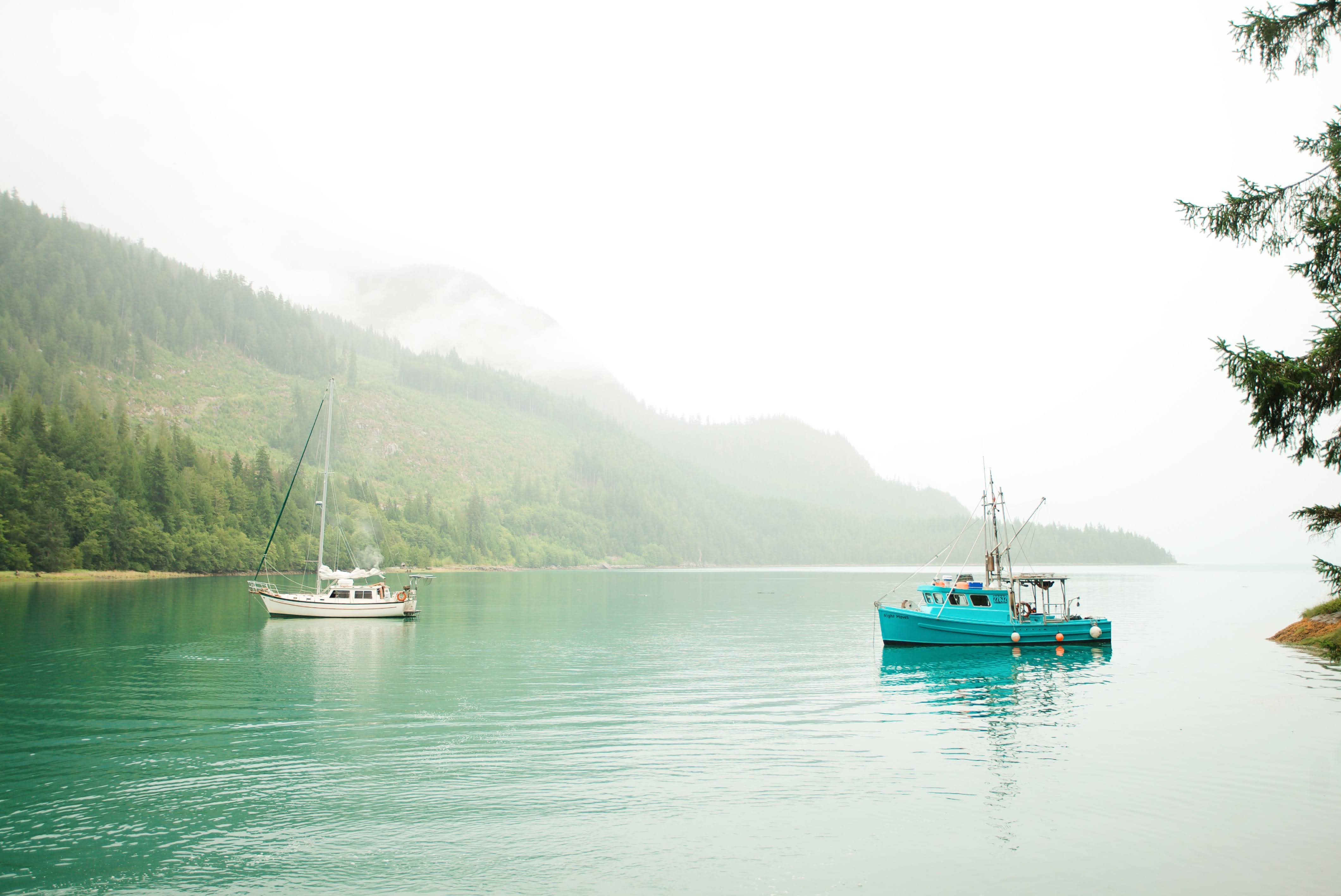 Boats on a misty BC inlet — Kowski Media